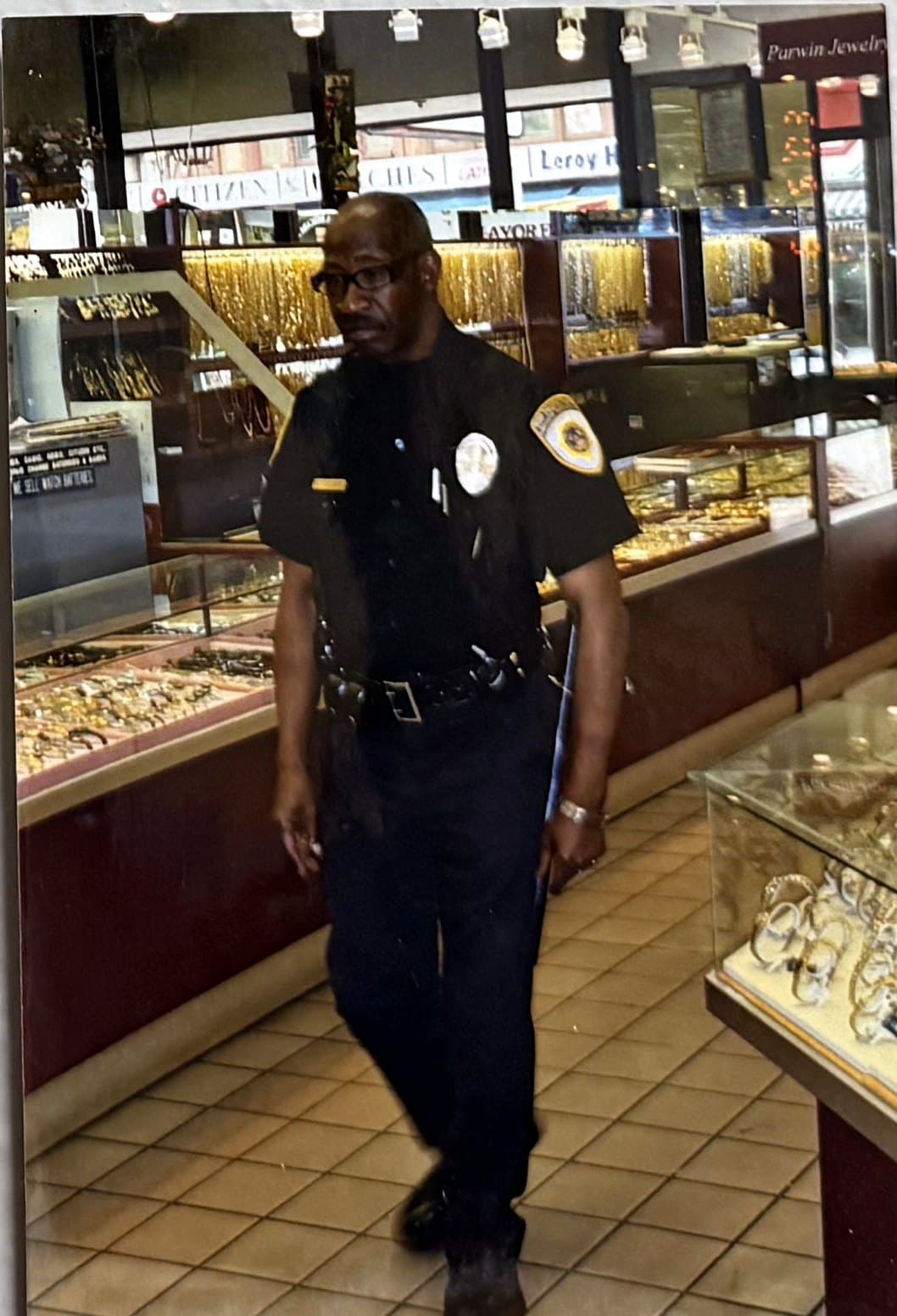 Officer patrolling a jewelry store sales floor